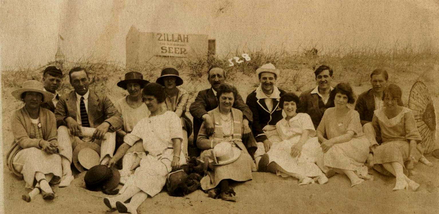 Old sepia photo of my grandparents, with a group of other young people, in Skegness