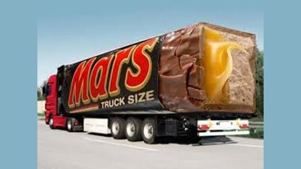 A wagon trailer which is designed to look like a giant Mars Bar labelled as 'Truck-Size'