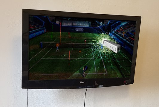 Wii remote smashed into a tv screen